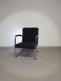 Buisframe armstoel. Met corduroy stof. Fana Metaal Rotterdam