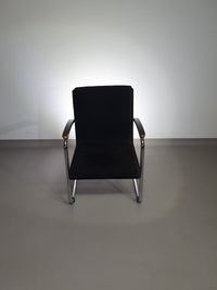 Buisframe armstoel. Met corduroy stof. Fana Metaal Rotterdam