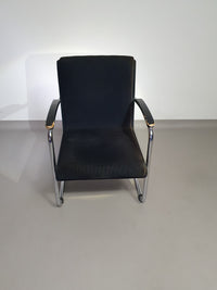 Buisframe armstoel. Met corduroy stof. Fana Metaal Rotterdam