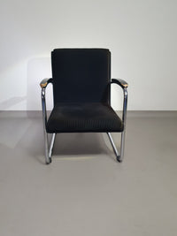 Buisframe armstoel. Met corduroy stof. Fana Metaal Rotterdam