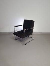 Buisframe armstoel. Met corduroy stof. Fana Metaal Rotterdam