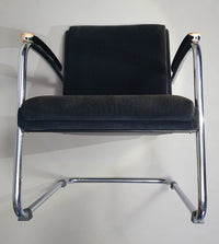Buisframe armstoel. Met corduroy stof. Fana Metaal Rotterdam