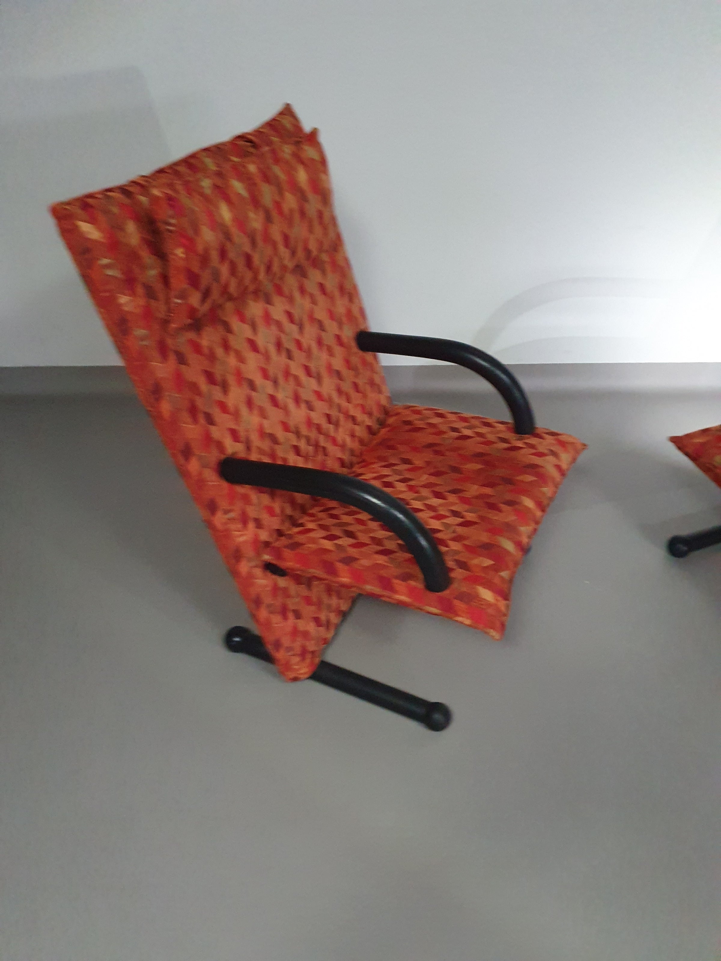 2 post modern t-line armchairs
