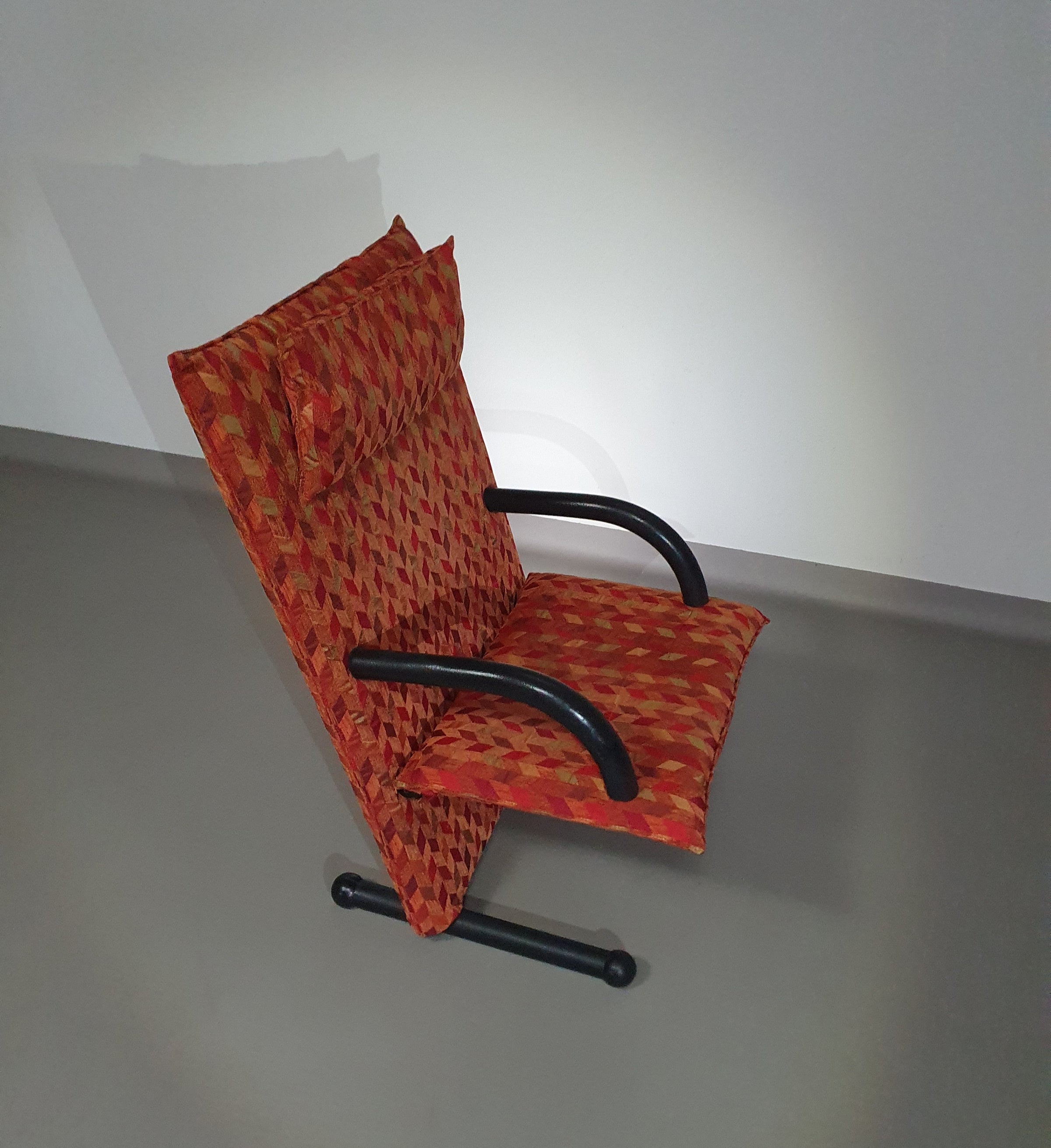 2 post modern t-line armchairs