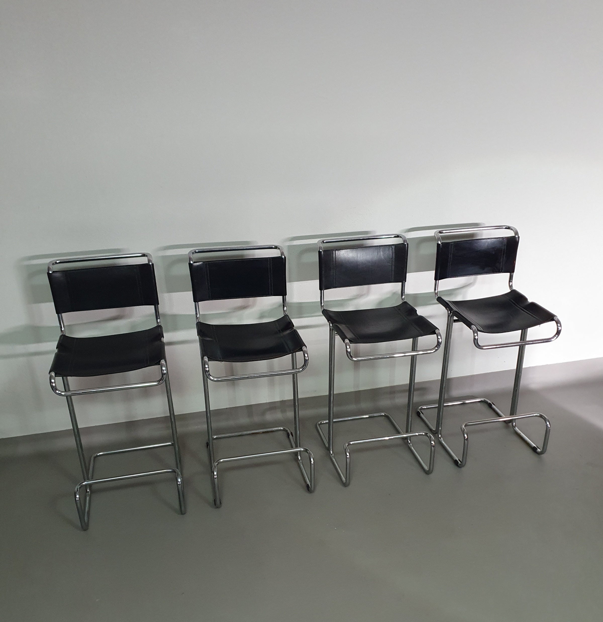4 x Italian bar stool by Stendig of steel tube and leather 1960s.