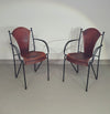 24 chairs in leather and solid wrought iron