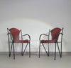 24 chairs in leather and solid wrought iron
