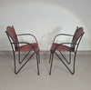 24 chairs in leather and solid wrought iron