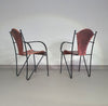 24 chairs in leather and solid wrought iron
