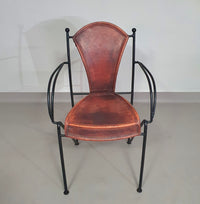 24 chairs in leather and solid wrought iron