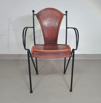 24 chairs in leather and solid wrought iron