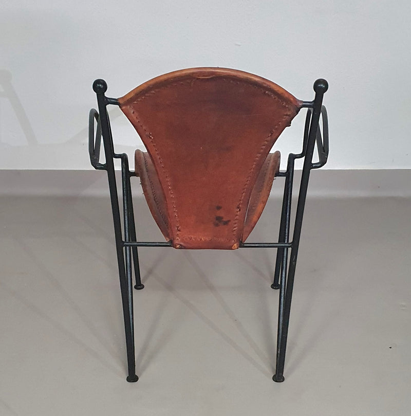 24 chairs in leather and solid wrought iron