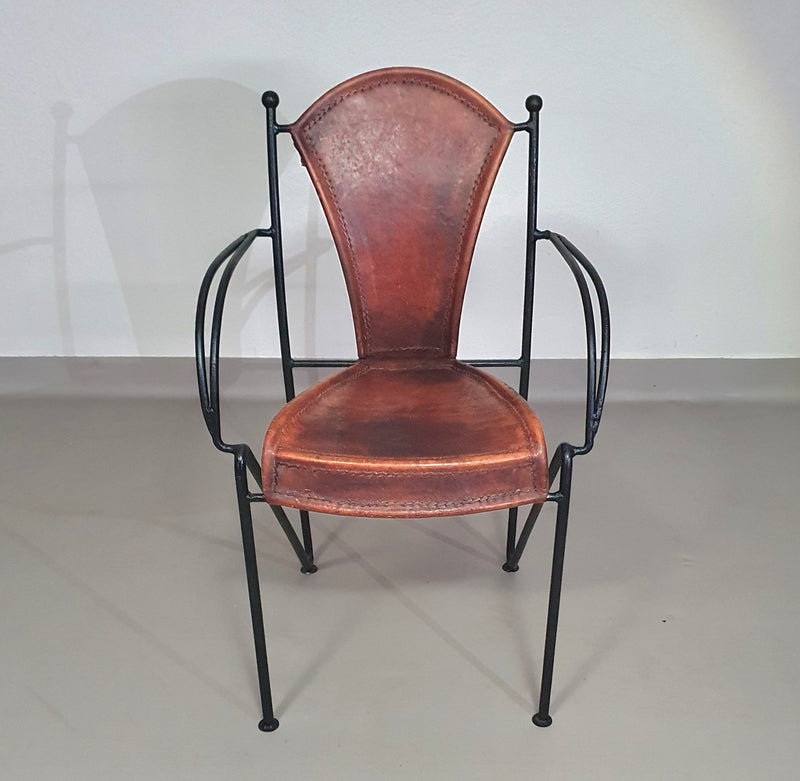 24 chairs in leather and solid wrought iron
