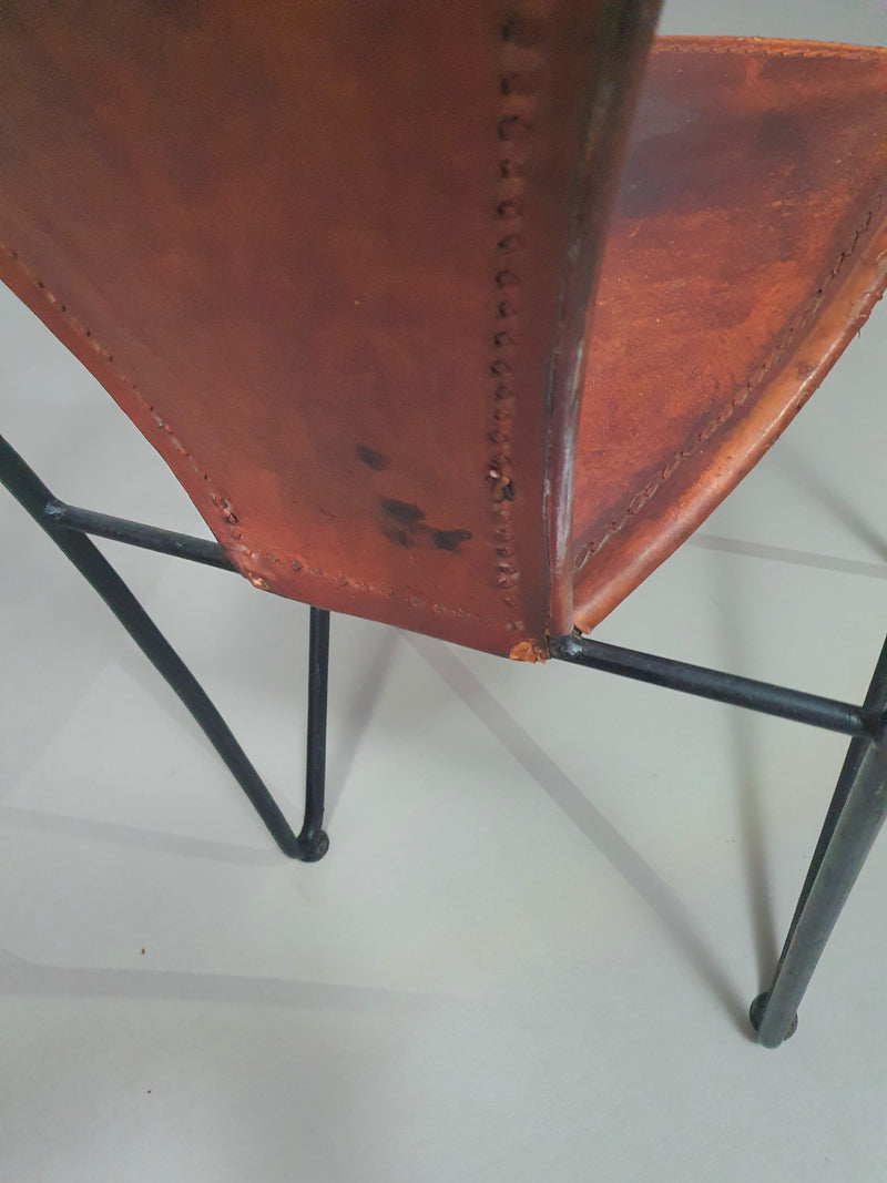 24 chairs in leather and solid wrought iron