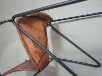 24 chairs in leather and solid wrought iron