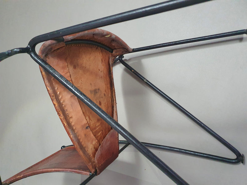 24 chairs in leather and solid wrought iron