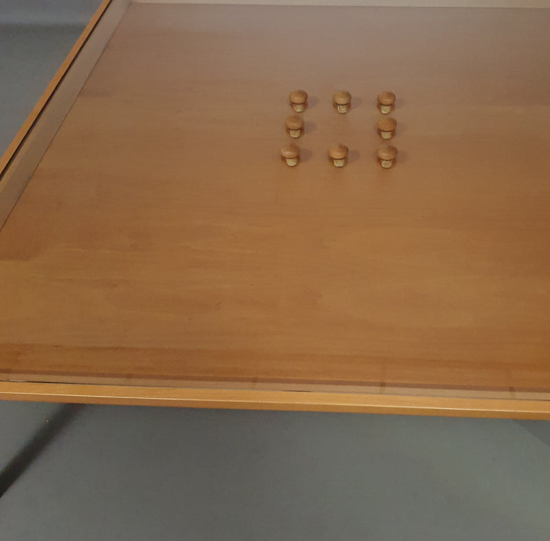Rare coffee table 110 x 110 x height 35 cm
with 8 flange wooden / cork caps in the glass top.