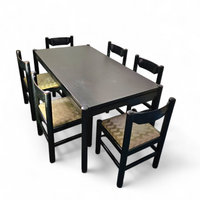 Rare dining set / Vico Magistretti / Italy / 1970s /
solid black painted wood / 6 x chair / matching table