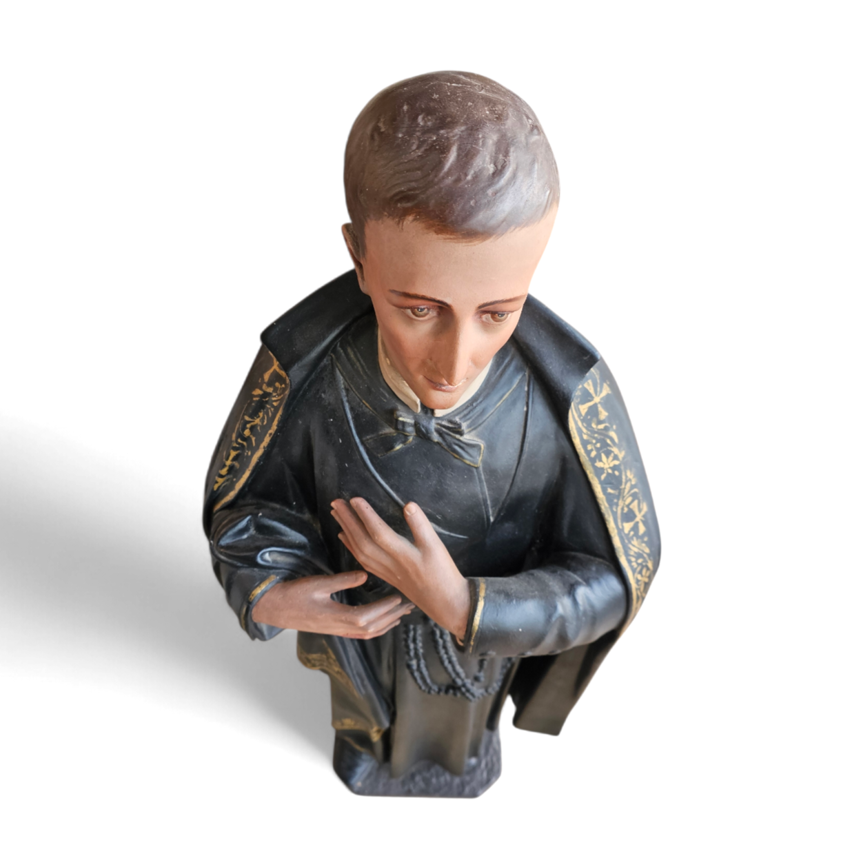 Statue of a religious figure / Patron Saint Gerard Majella / placed in a Gothic niche / labeled /