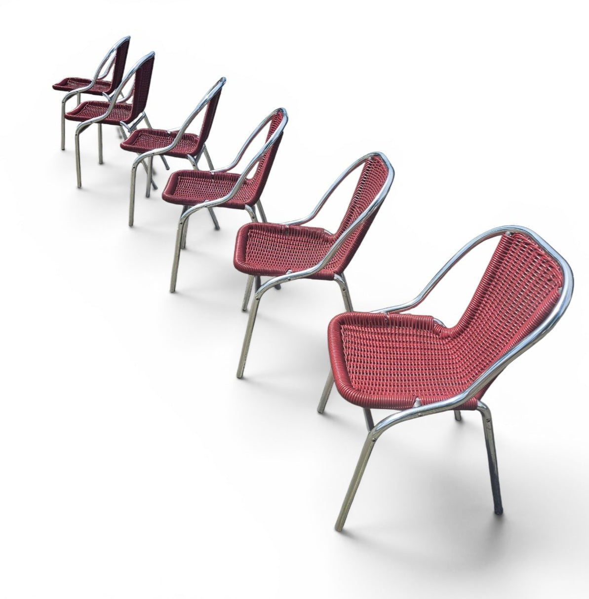 6 x red aluminum inside / outsite chair featuring synthetic weave (wicker/rattan look) 1980s