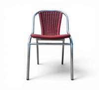 6 x red aluminum inside / outsite chair featuring synthetic weave (wicker/rattan look) 1980s
