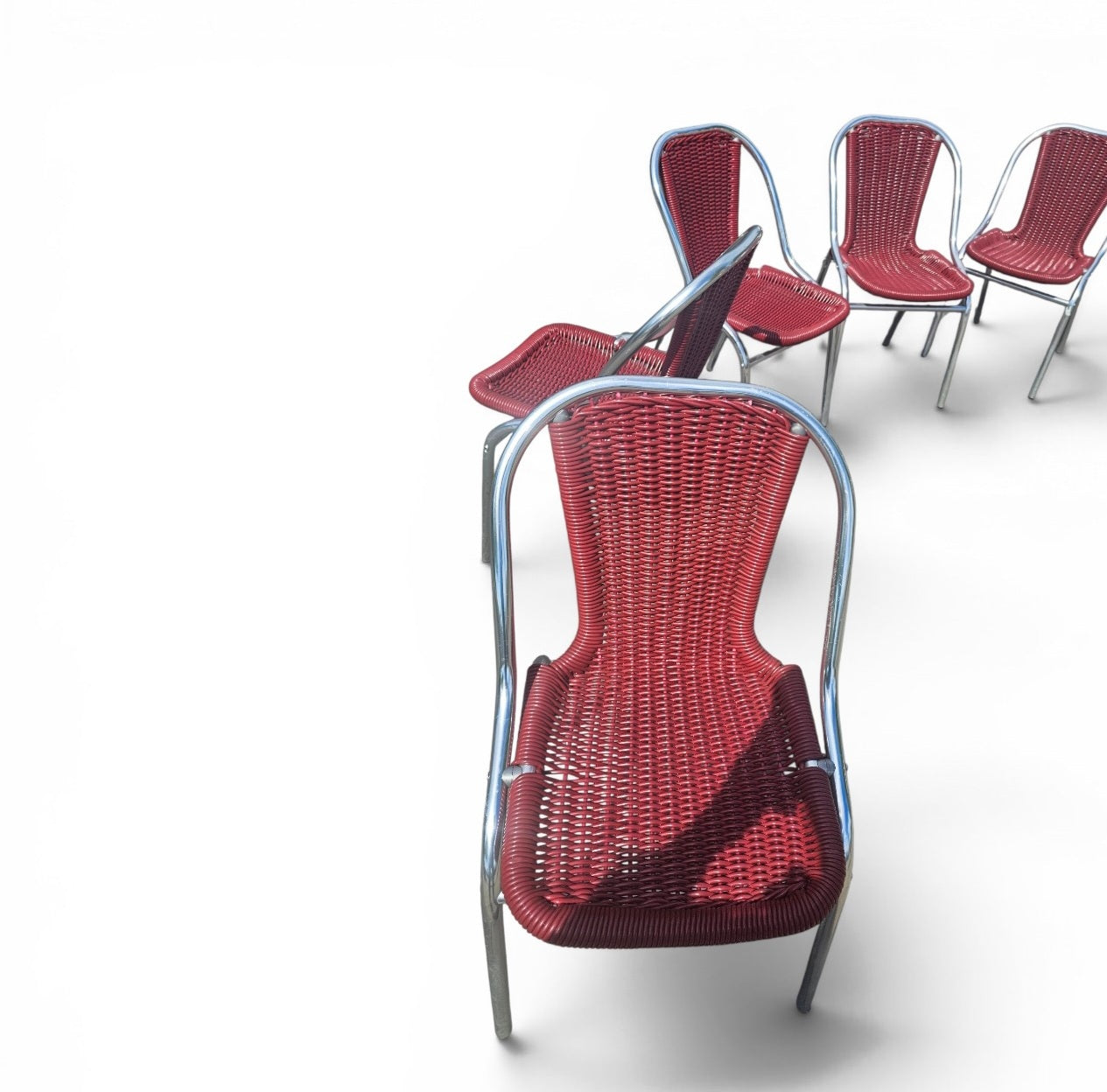 6 x red aluminum inside / outsite chair featuring synthetic weave (wicker/rattan look) 1980s