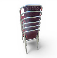 6 x red aluminum inside / outsite chair featuring synthetic weave (wicker/rattan look) 1980s