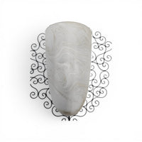 Wrought iron pocket wall sconces featuring a frosted amber glass / metal frame
