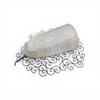 Wrought iron pocket wall sconces featuring a frosted amber glass / metal frame