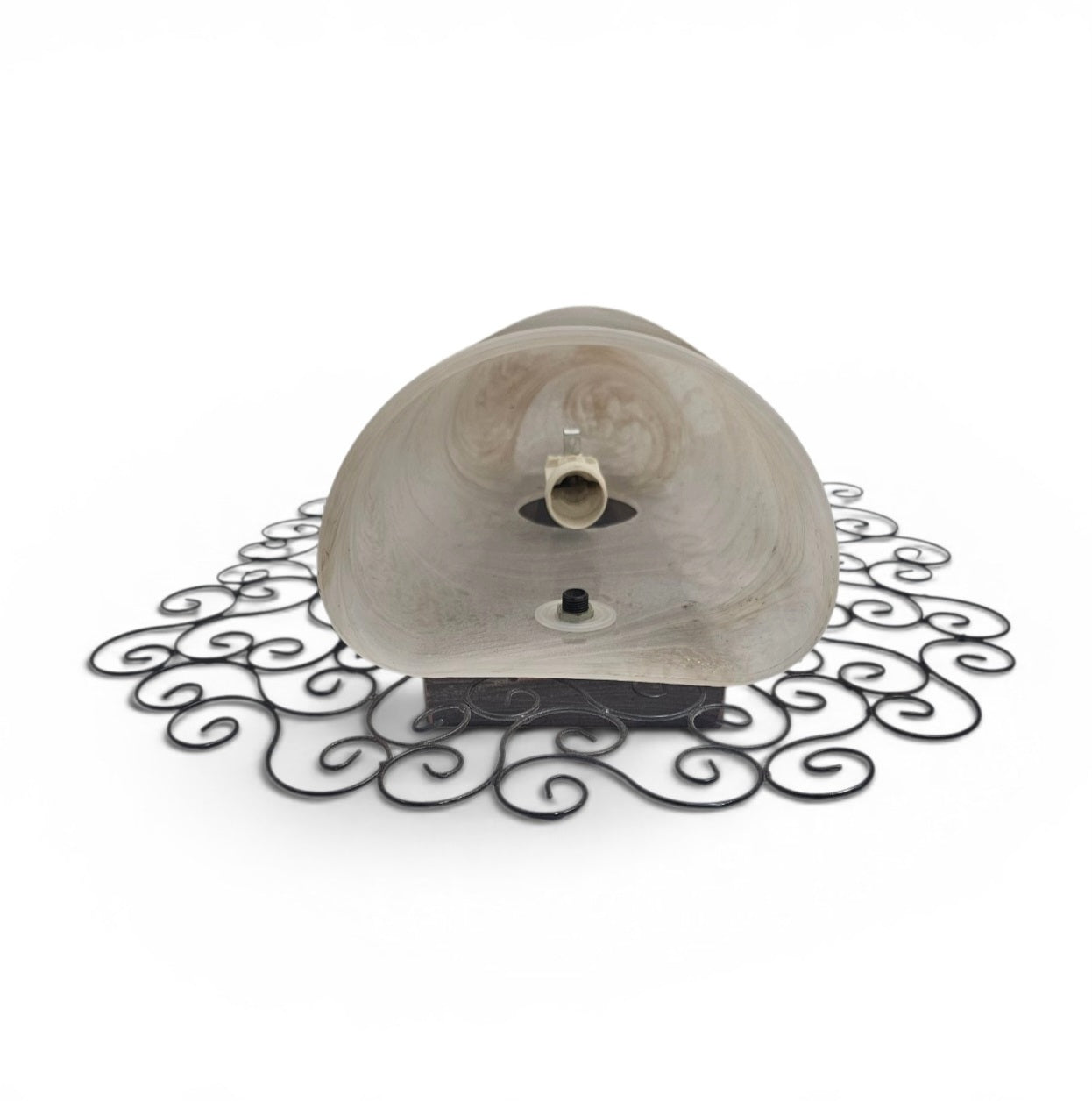 Wrought iron pocket wall sconces featuring a frosted amber glass / metal frame