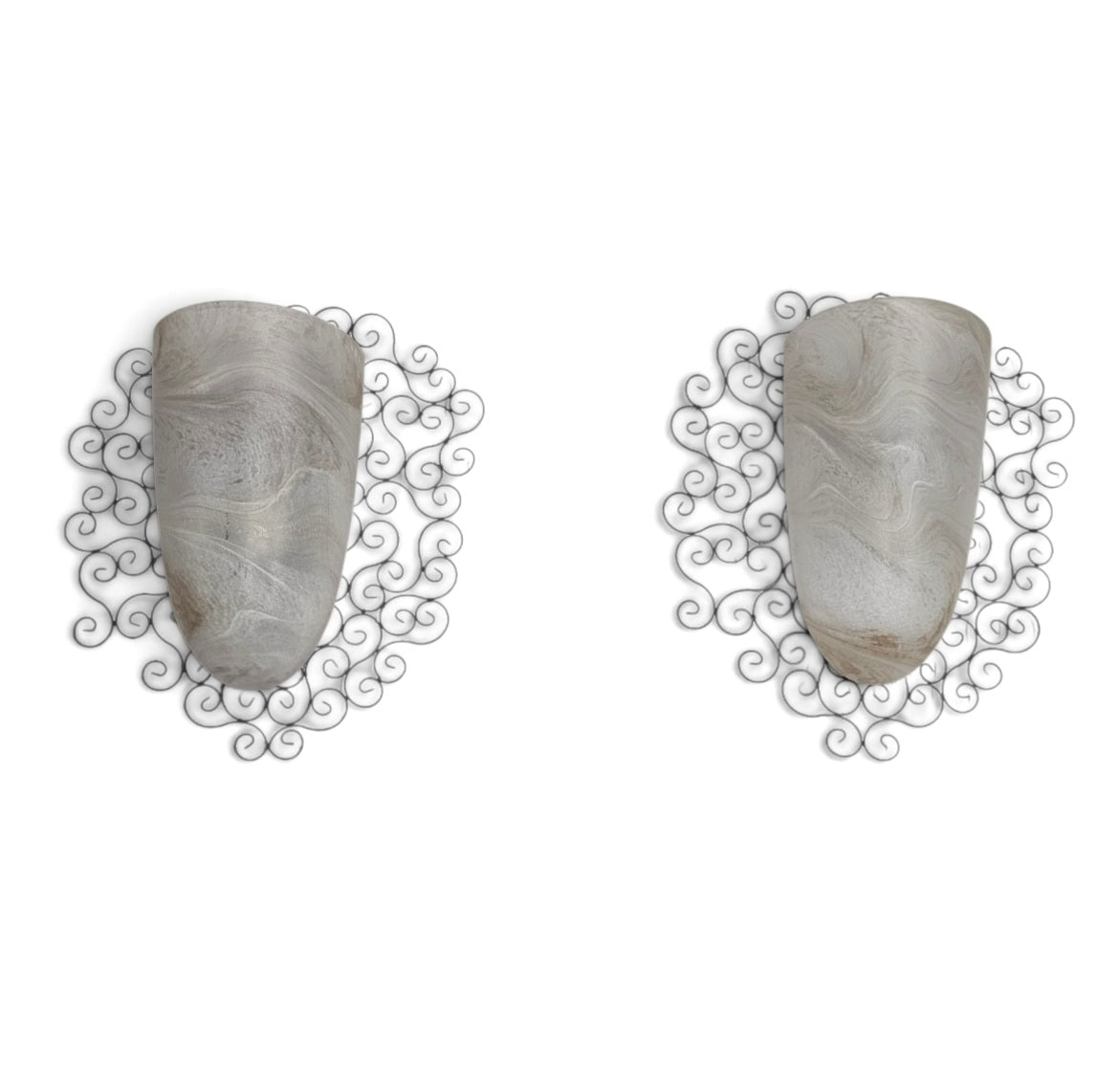 Wrought iron pocket wall sconces featuring a frosted amber glass / metal frame