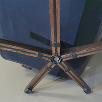 Prachtige vintage design Leolux draaifauteuil, uitgevoerd in bruin/donkerbruin/zwart leer en houten frame