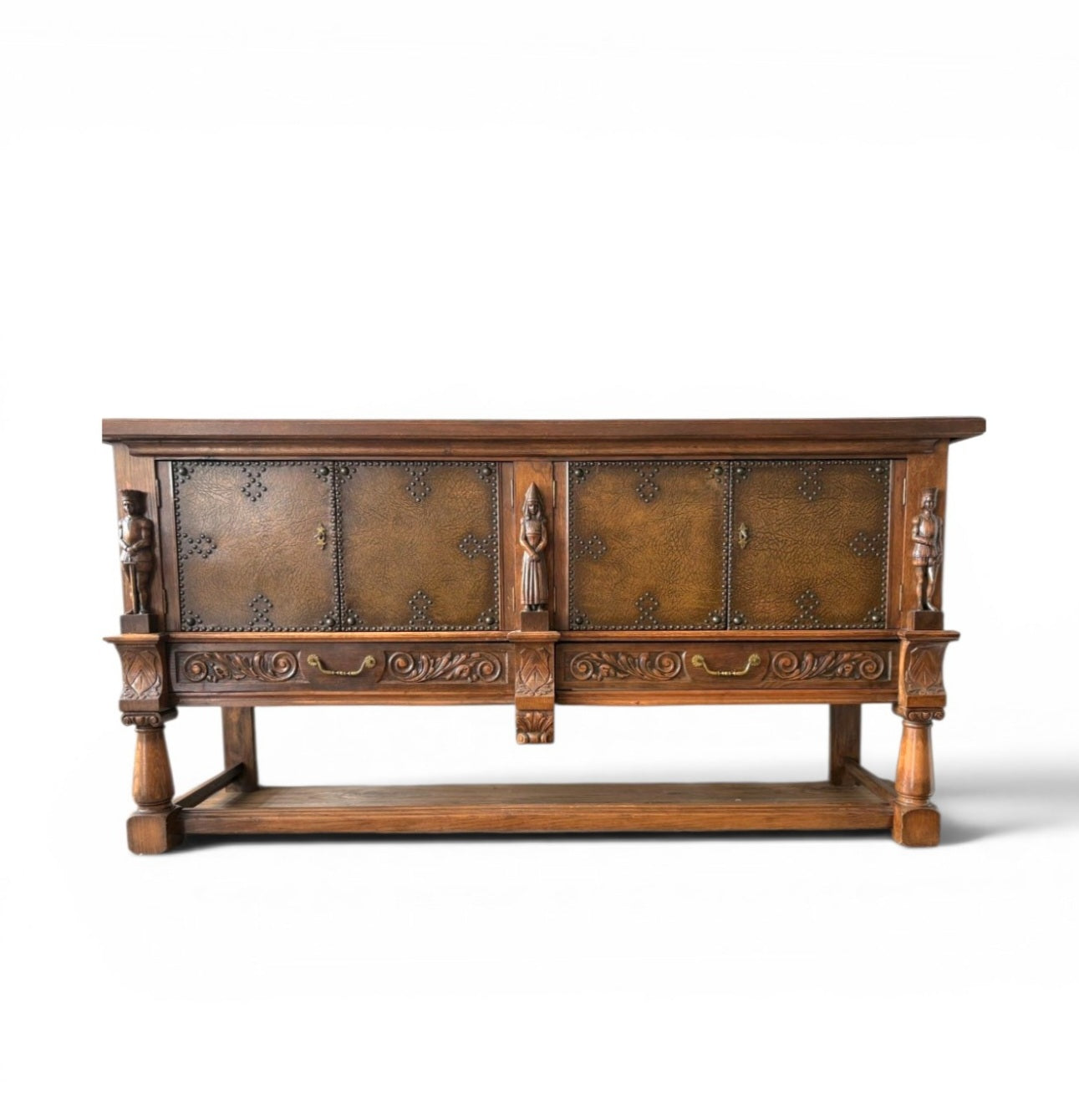 Mechelen Spanish sculptured sideboard / leather covered panels with decorated nails / 1960s