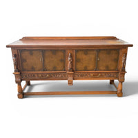 Mechelen Spanish sculptured sideboard / leather covered panels with decorated nails / 1960s