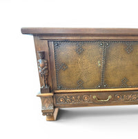 Mechelen Spanish sculptured sideboard / leather covered panels with decorated nails / 1960s