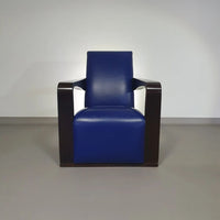 4 x Vintage Ying lounge chairs / fauteuils van Hugues Chevalier, jaren 1990. 3 x blauw / 1 x rood leer. Speciaal gemaakt in deze kleuren voor Tommy Hilfiger. Met gebruikssporen.