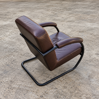 2 X dark brown / bordeaux red / weighty leather club chairs / 1980s