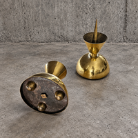 2 x Postmodern brass hammered diabolo shaped candles / height 26 cm / 1970s