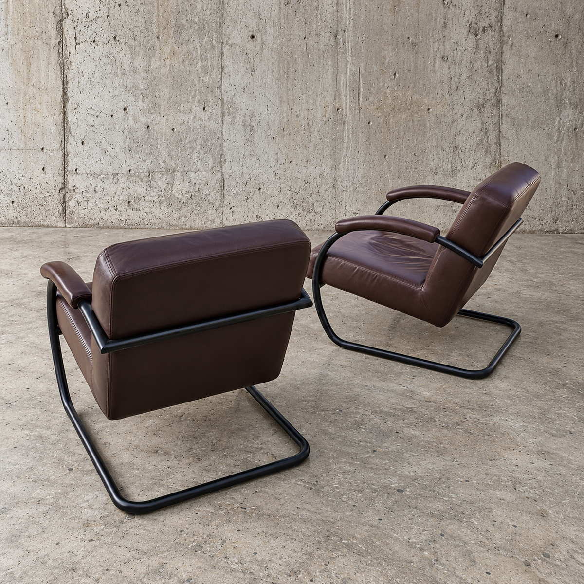 2 X dark brown / bordeaux red / weighty leather club chairs / 1980s