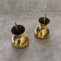 2 x Postmodern brass hammered diabolo shaped candles / height 26 cm / 1970s
