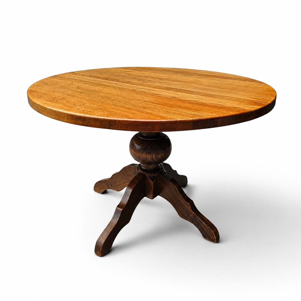 solid oak dining table / also known as a monastery table / with a sturdy central pedestal / Its heavy-duty construction