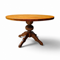solid oak dining table / also known as a monastery table / with a sturdy central pedestal / Its heavy-duty construction