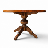 solid oak dining table / also known as a monastery table / with a sturdy central pedestal / Its heavy-duty construction