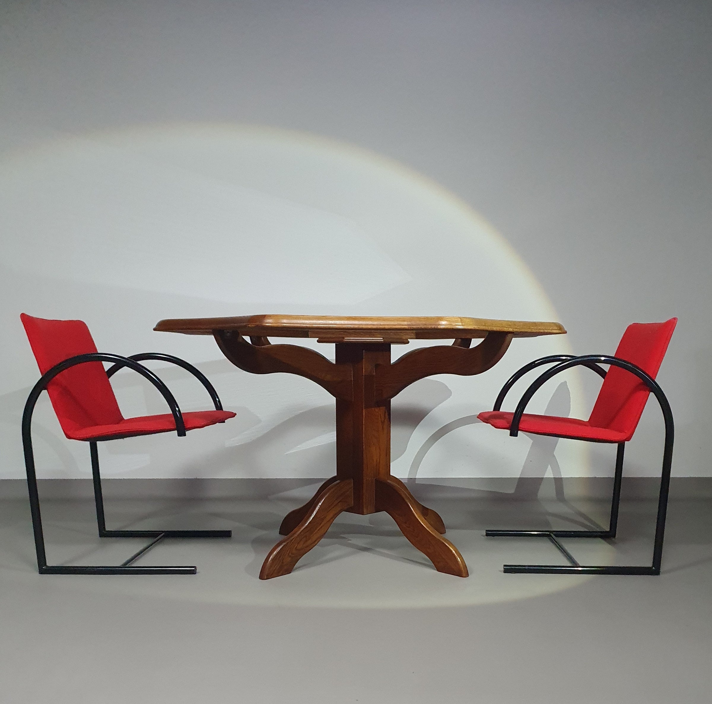 Octagonal oak dining table with inlaid glass top