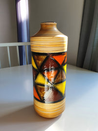 Mid-century pattern Vetrata vases and bowls by Aldo Londi for Bitossi Italy. Black, blue, orange and yellow on a brushed background.